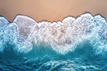 Foto op Plexiglas A ocean waves and beach top view, natural background. © TATIANA