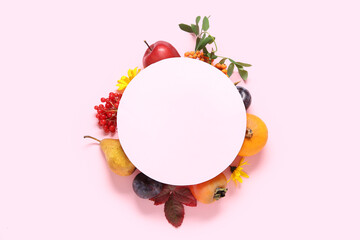 Composition with blank card and different fruits on pink background