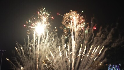 Golden fireworks that actually shine with bokeh lights in the night sky. Fiery fireworks display Fireworks celebration to bid farewell to the old year and welcome the new year