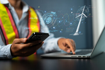 Engineers use AI artificial intelligence to inspect wind turbines and analyze the data of the...