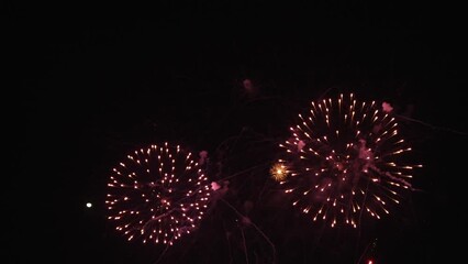 Golden fireworks that actually shine with bokeh lights in the night sky. Fiery fireworks display Fireworks celebration to bid farewell to the old year and welcome the new year