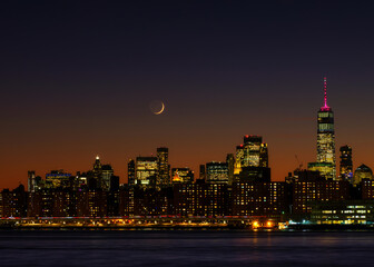 Manhattan at dawn with Waxing Crescent moon