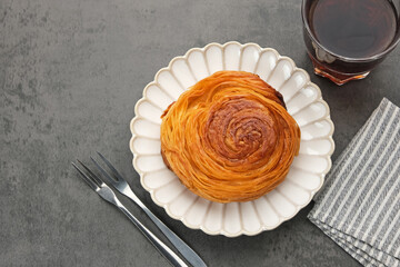 Kouign Amann, pastry with a layer of sweet caramel with a crunchy texture
 - obrazy, fototapety, plakaty
