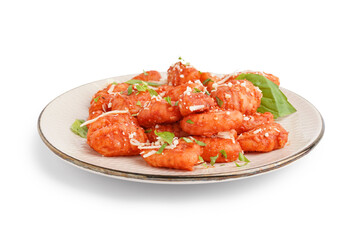 Plate of tasty gnocchi with cheese on white background