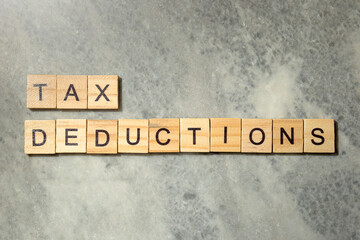 Wooden cubes with TAX DEDUCTIONS letters