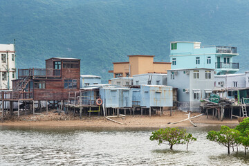 Obraz premium Residential stilt house with tin siding in Tai O fishing village, Lantau island, Hong Kong