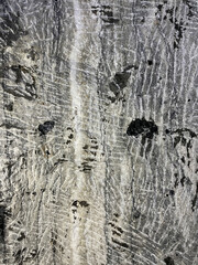 a rough stone wall texture with scratches