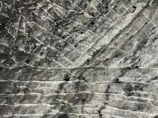 a rough stone wall texture with scratches