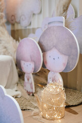 Small and cute people figure printed in stereofoam for ramadan or valentine day seasonal decoration on the side of cafe or restaurant corner as a welcome sign