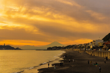 Scenery Kamakura Yuigahama Beach with Kamakura city and Fujisan mountain. Twilight silhouette Mount...
