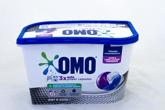 Johannesburg, South Africa - a box of Omo washing capsules isolated on a clear background with copy space