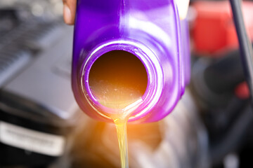 	
Refueling and pouring oil quality into the engine motor car Transmission and Maintenance Gear...