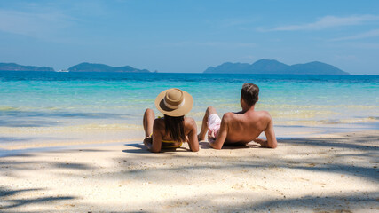 Koh Wai Island Trat Thailand is a tinny tropical Island near Koh Chang. a young couple of men and...