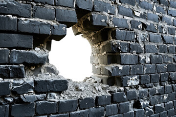 Hole in black brick wall