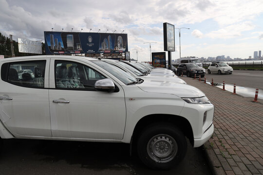 BATUMI, GEORGIA -  01, MAY, 2023: Trucks, pick-up CARS Mitsubishi L200 parked in the row at a car dealership.