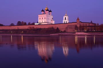 Fototapeta na wymiar Lilac October evening at the ancient Pskov Kremlin. Pskov, Russia
