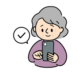 スマホをチェックするシニア女性