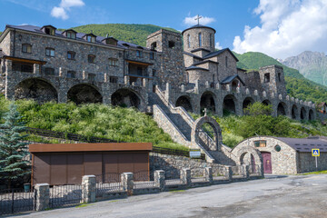 Fototapeta premium Orthodox Alan Assumption Monastery on a sunny June morning. Hidicus. Northern Ossetia-Alania, Russian Federation