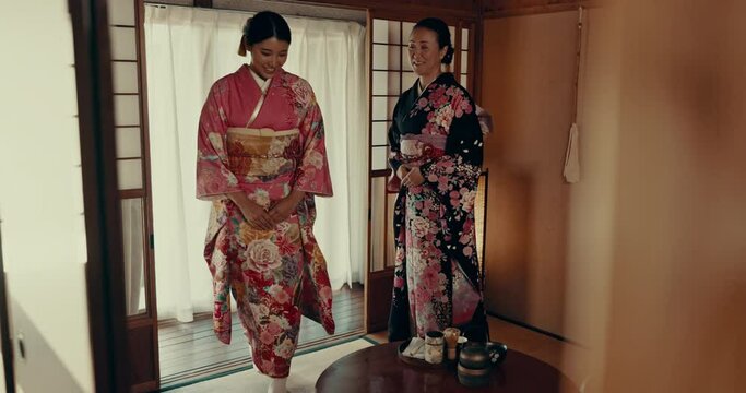 Women in traditional Japanese bow with kimono and welcome in tea room with mindfulness, smile and hello. Happy friends meeting at calm teahouse with greeting, respect and zen culture in home.