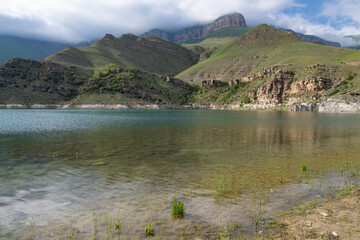 Fototapeta na wymiar Gizhgit lake on a June day. Kabardino-Balkaria, Russian Federation