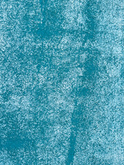 Old covering on a sports ground as an abstract background. Texture