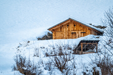 Church of Santo Spirito immersed in the snow of Val Aurina