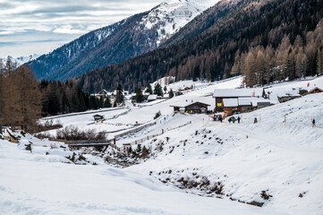 Fototapeta premium Church of Santo Spirito immersed in the snow of Val Aurina