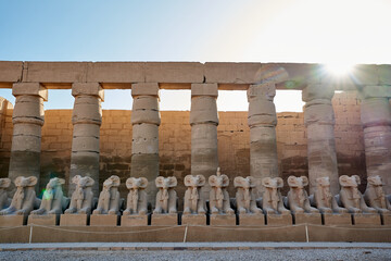 Ram-headed sphinx in Great Court of Karnak Temple. Luxor. Egypt .