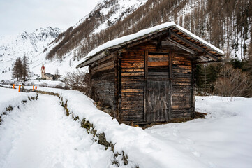 Church of Santo Spirito immersed in the snow of Val Aurina