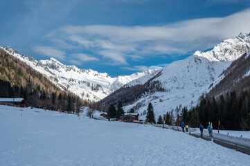 Fototapeta na wymiar Church of Santo Spirito immersed in the snow of Val Aurina