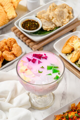 dessert is fresh fruit ice from Indonesia which combines various fruits, sago pearls and sweet and fresh sauce.