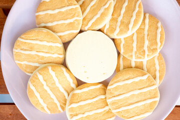white cookies on a plate