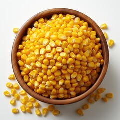 Sweet corn kernels in wooden bowl