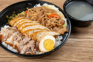 angle view Longjiang trotter rice with pork and sausage and pickled cabbage and vegetable and egg and rice and soup at horizontal composition