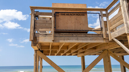 Lifeguard stand wooden hut on sand beach baywatch cabin