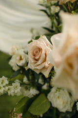 Close up of beautiful light pink rose in a floral arrangement