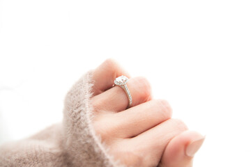 Halo Diamond Ring on Woman's Closed Hand - obrazy, fototapety, plakaty