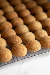 Freshly Baked eclair choux on a wire rack