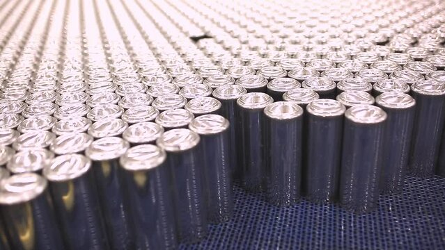 Conveyor line with the production of aluminum cans. Production of aluminum cans for drinks. Plant of high-tech equipment for the food industry.