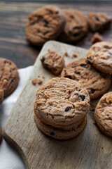 Oatmeal cookies with pieces of chocolate. on a wooden background. snack