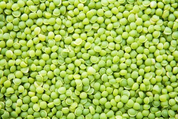 pile of smooth, round green peas tightly packed