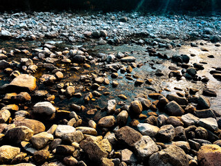 Korea River Bank with Rocks Water Streaming Background