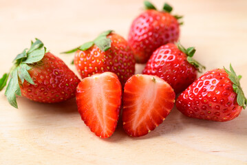 Fresh strawberry fruit on wooden background, healthy fruit