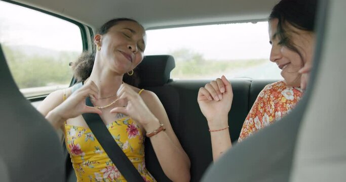 Girl friends, singing and road trip in car with dancing, smile and sound on radio for holiday. Women, dancer and happy with singalong, karaoke and carpool with driving, noise and listening to music