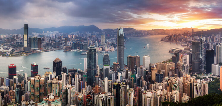 Hong Kong skyline at dramatic sunrise, Victoria harbour