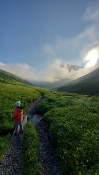 boy in the mountains on a hike, nature, sky, mountains