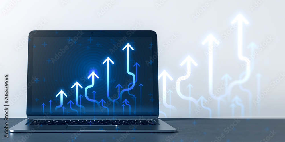 Poster close up of laptop computer at workplace with growing blue business chart arrows on blurry backgroun