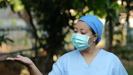 nurse in protective mask