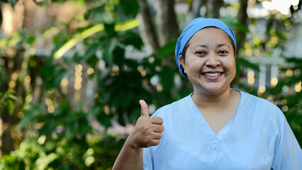 happy nurse with thumbs up