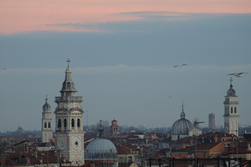 Fototapeta na wymiar Scenic view of the Venice skyline with beautiful historical buildings at sunset
